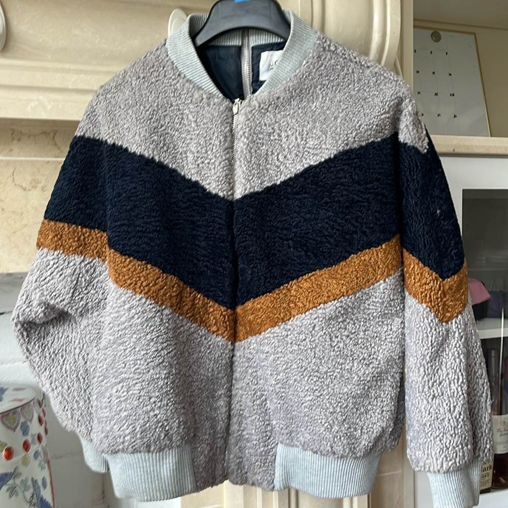 JOA brand bomber with v design. Like new, size small